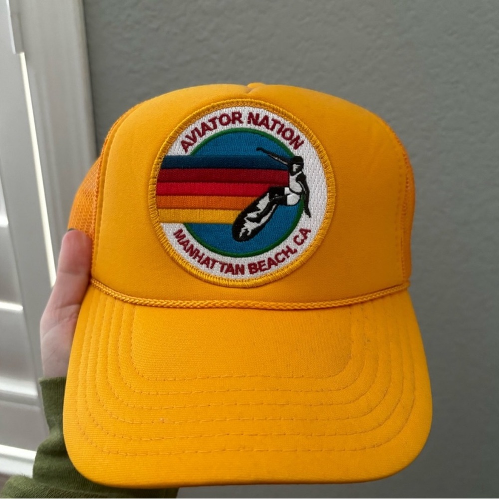 yellow aviator trucker hat